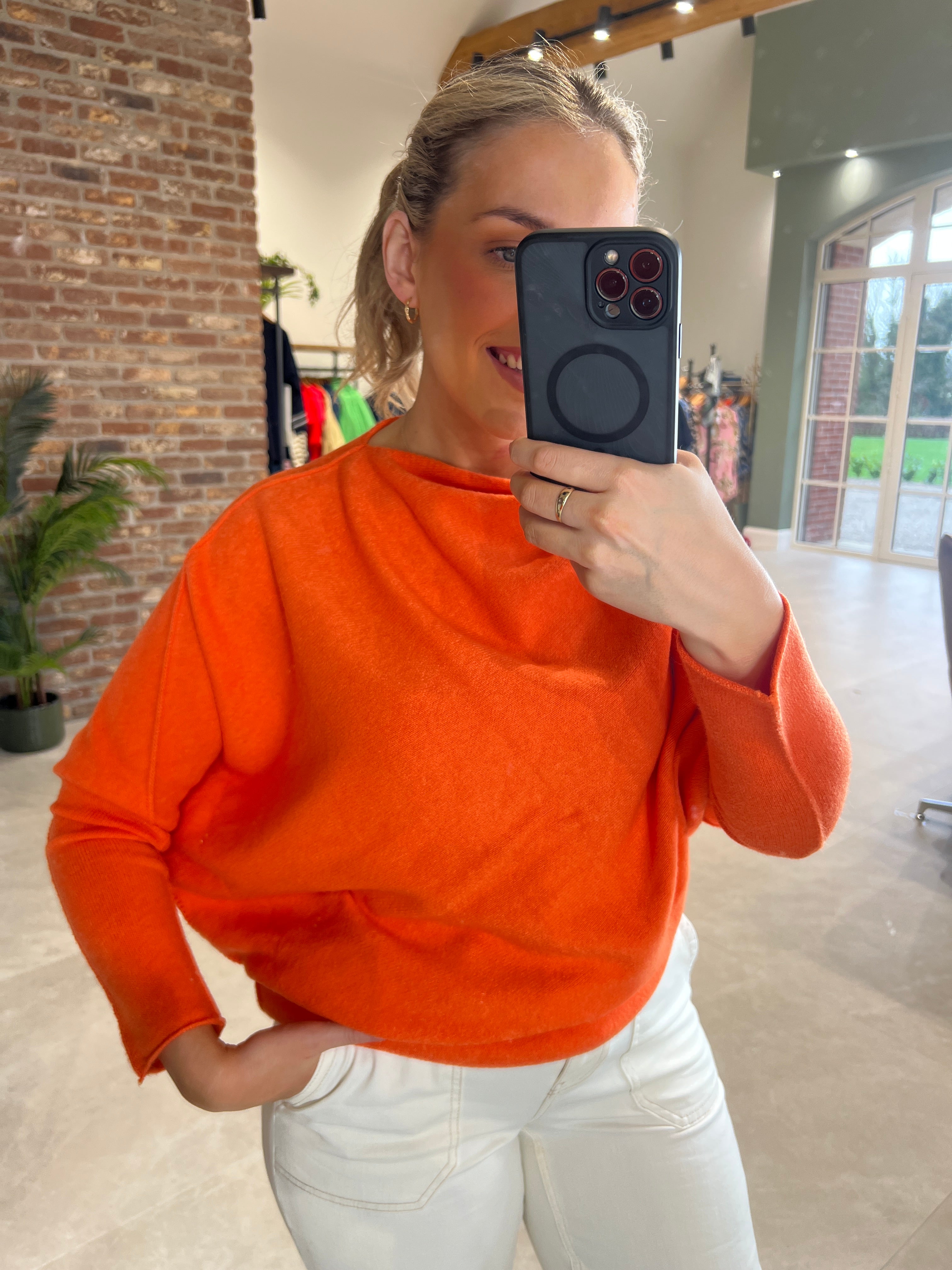 Deck By Decollage Asymmetric Knit In Orange