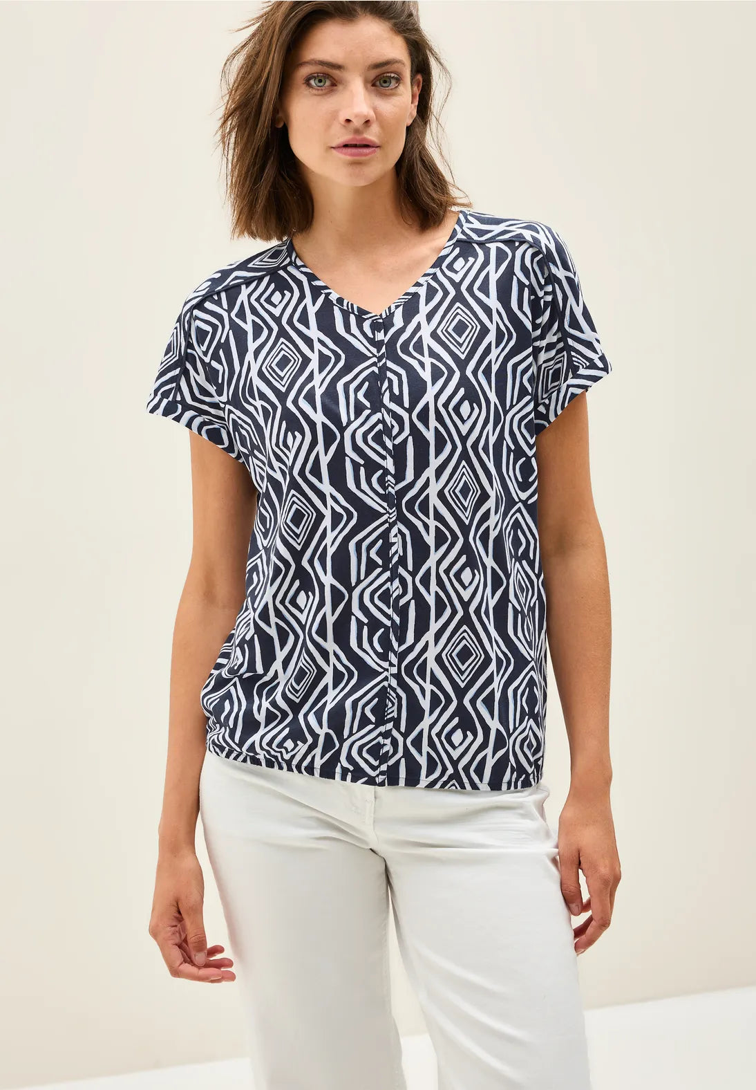 Cecil Giraffe Print Top In Universal Blue