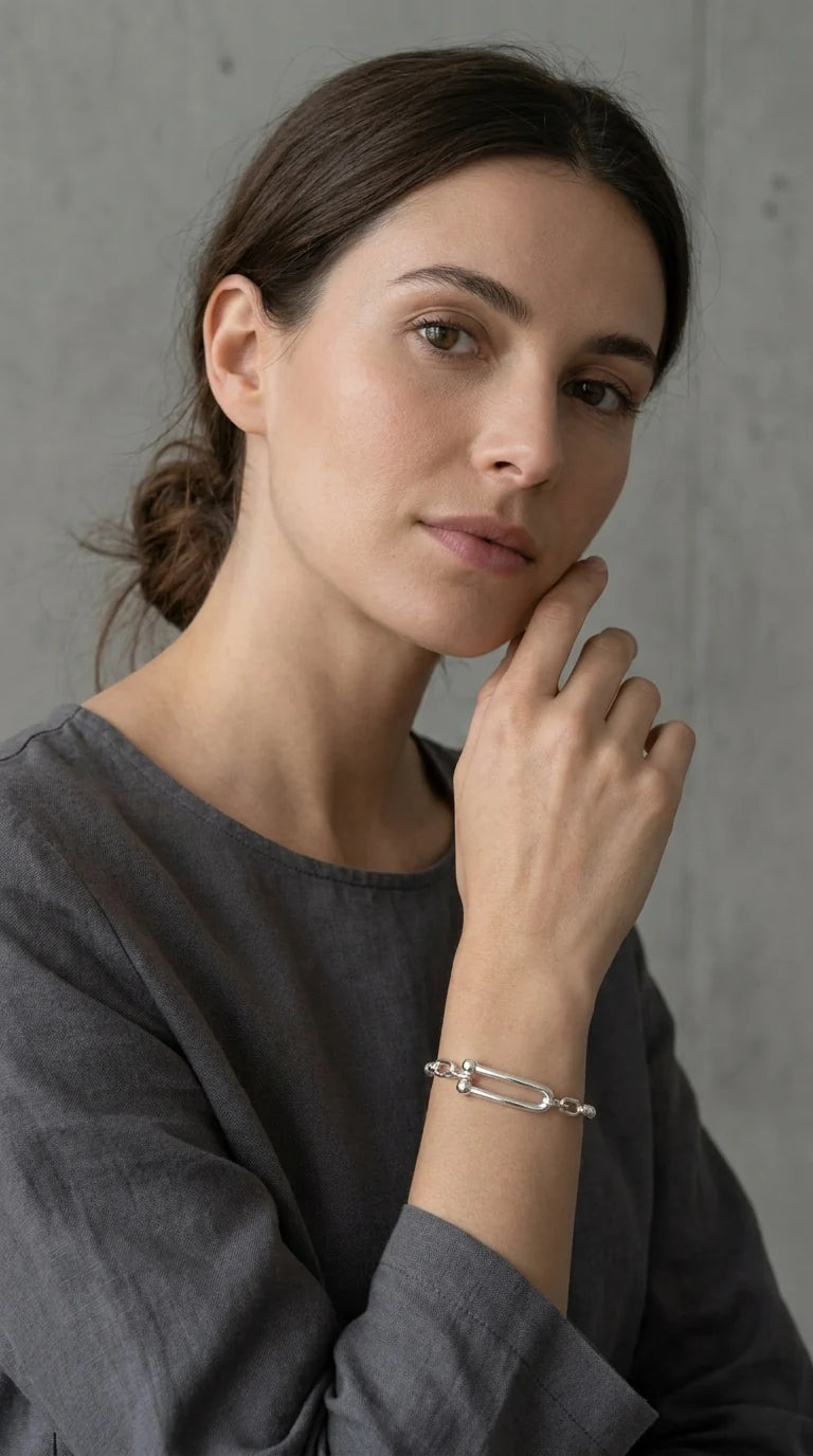 Silver beaded elasticated bracelet with bar design