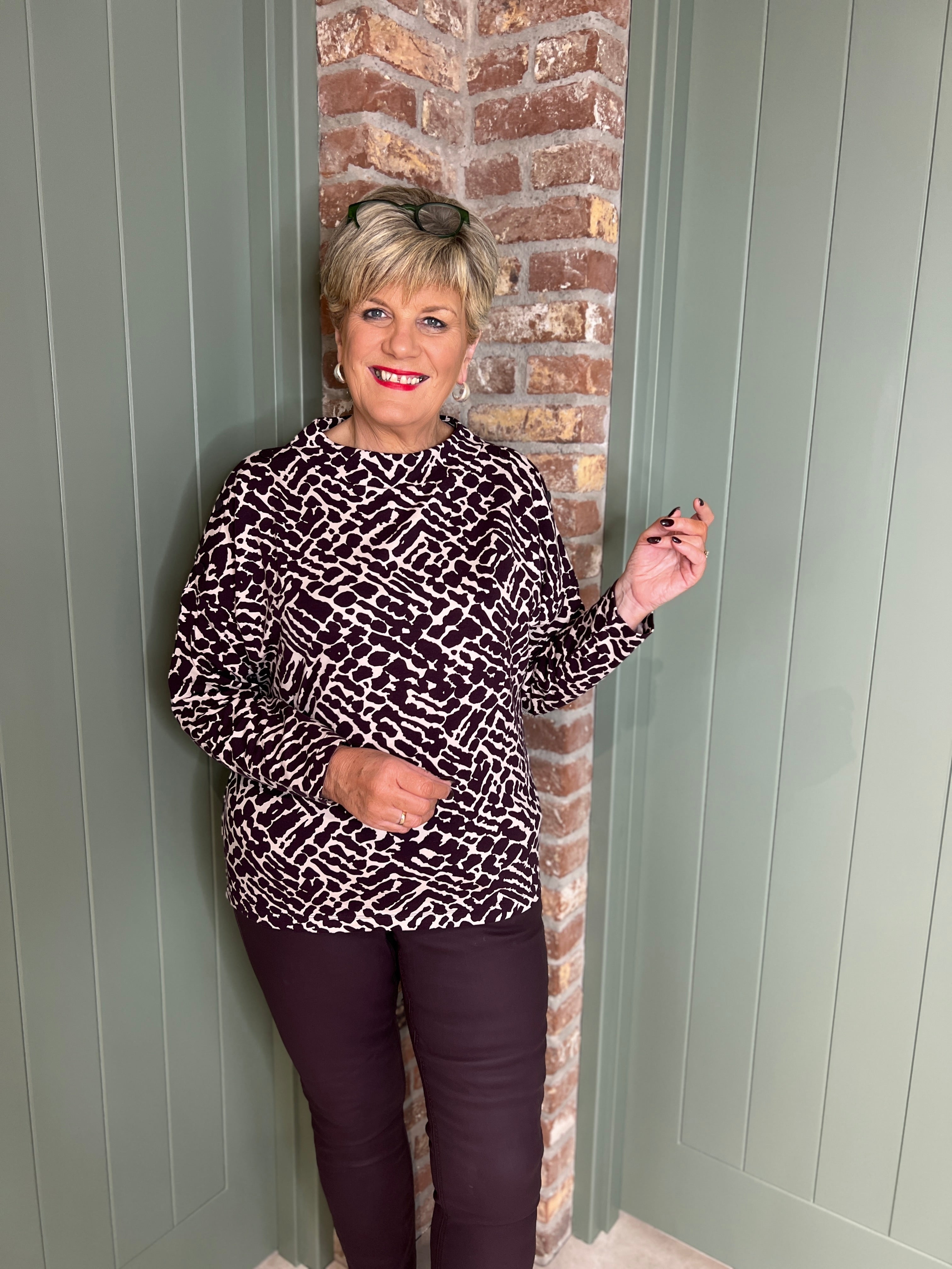 Cecil Buttoned Funnel Top In Eggplant Red