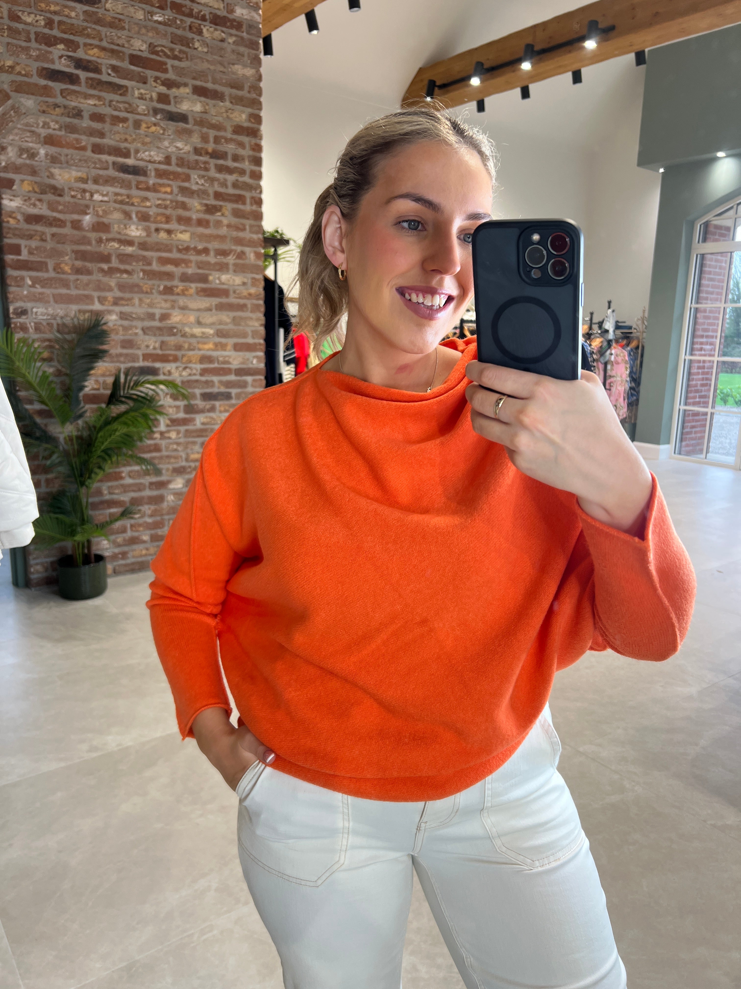 Deck By Decollage Asymmetric Knit In Orange