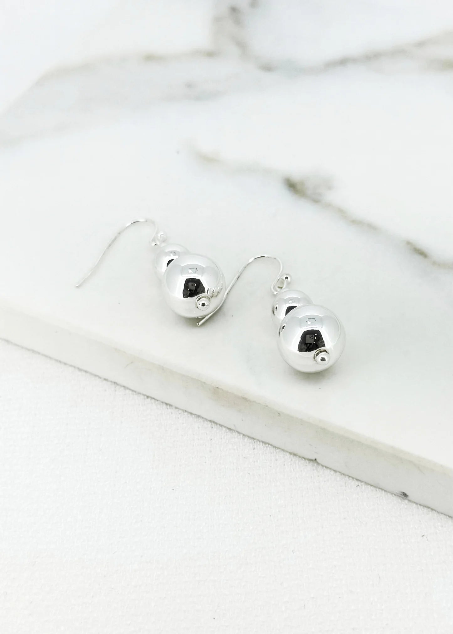 Envy Ball Dropper Earrings In silver