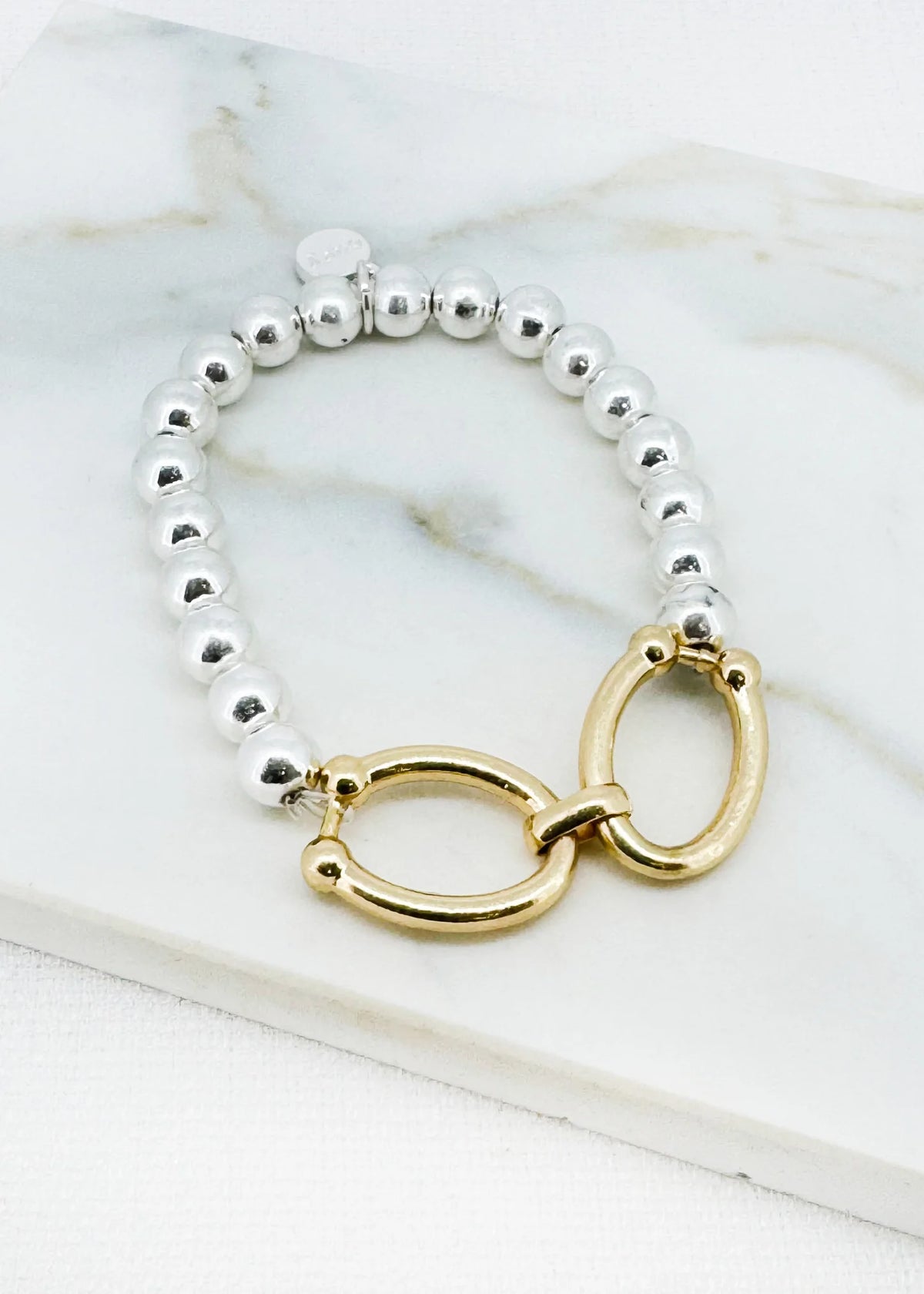 Silver and gold two tone elasticated bracelet with link design