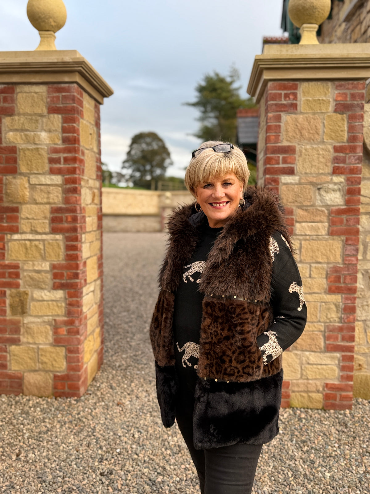 Animal print gilet with studs in brown & black
