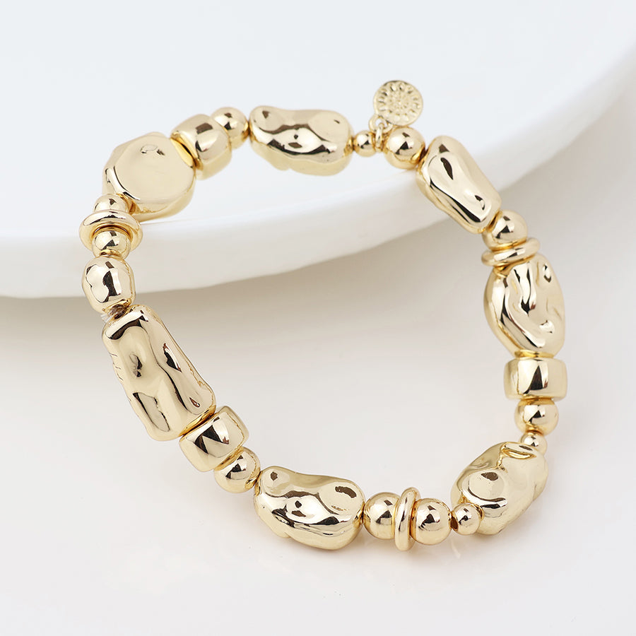 Pom Organic bead bracelet In gold