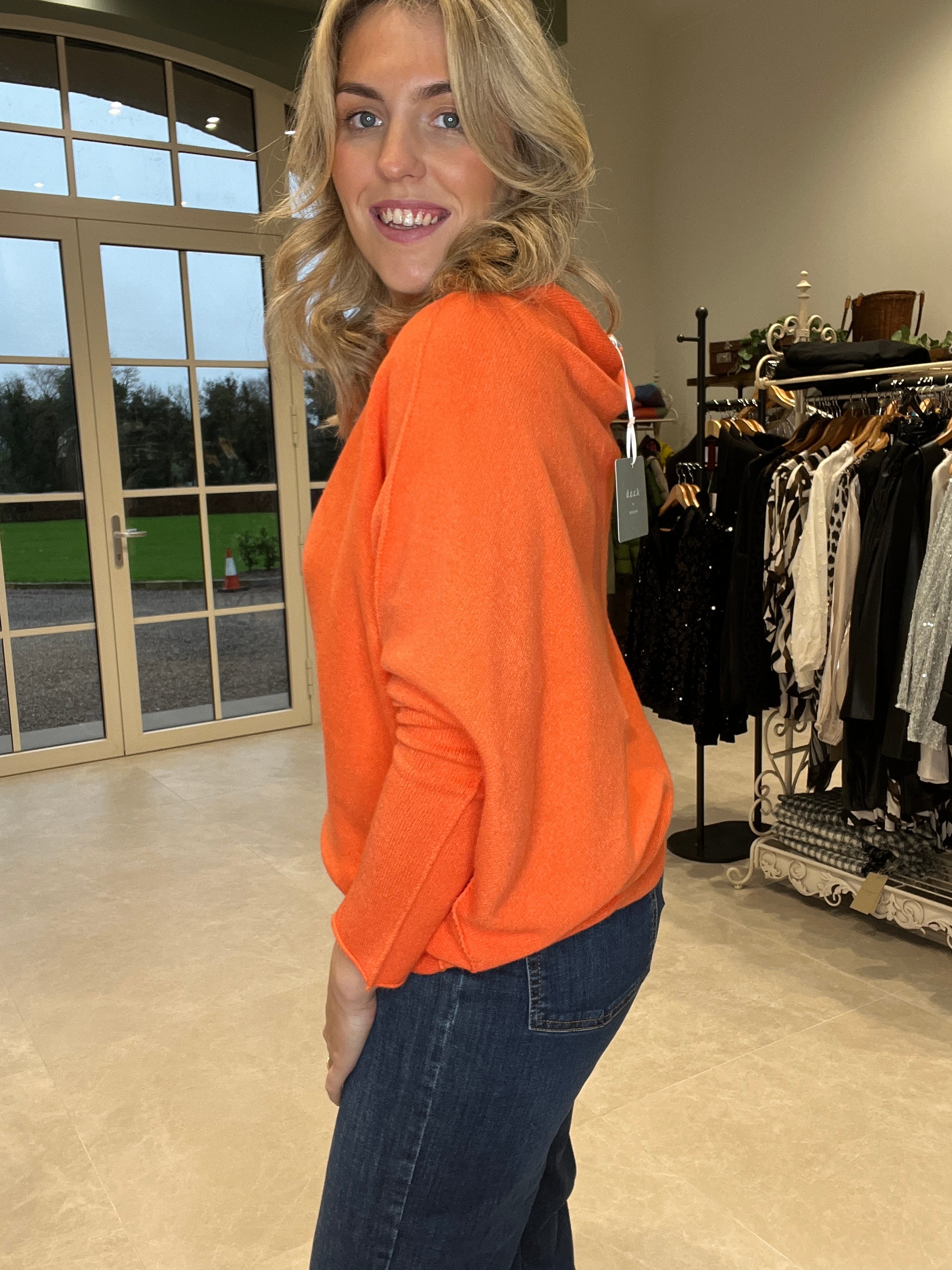 Deck By Decollage Asymmetric Knit In Orange