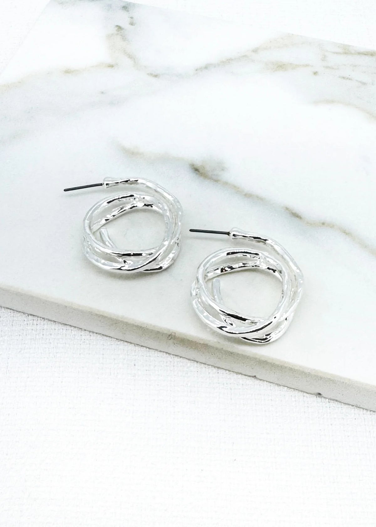 Silver twisted hoop earring