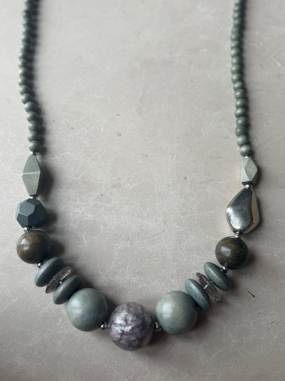 Different shaped ball necklace in duck egg mix