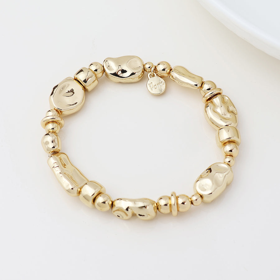 Pom Organic bead bracelet In gold