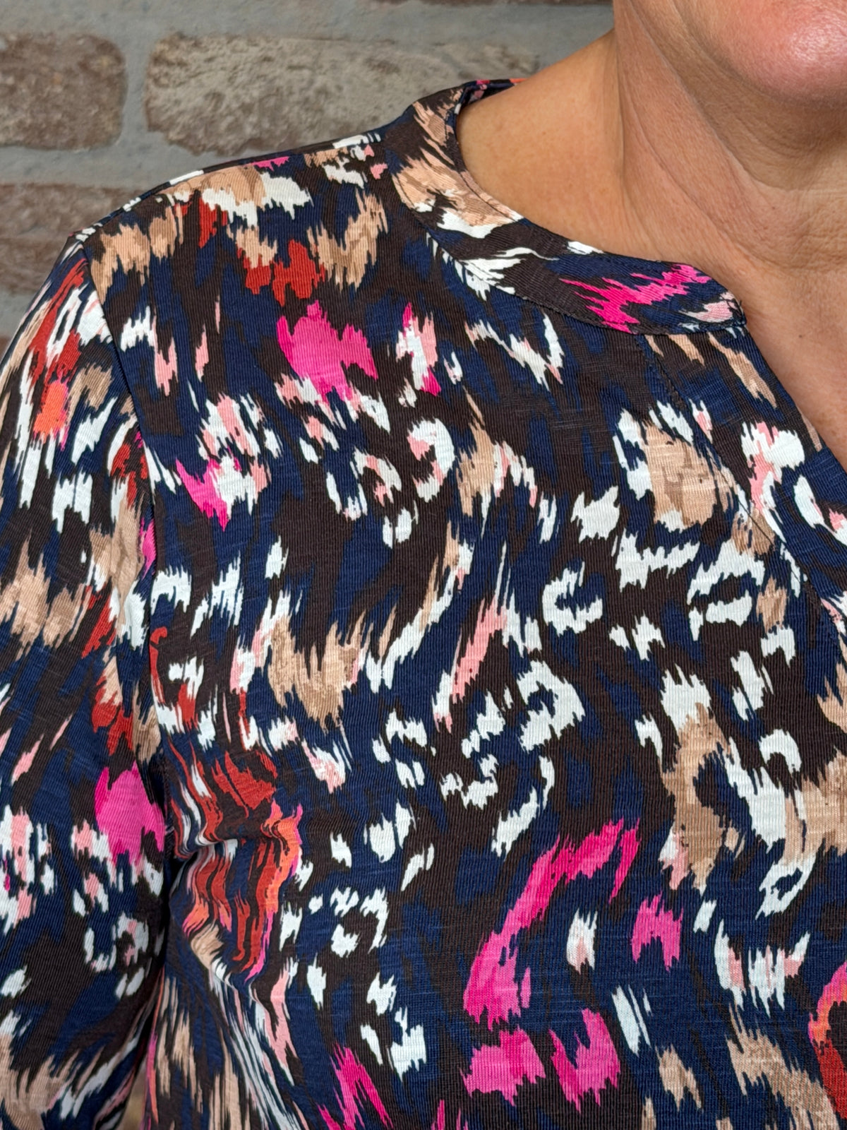 Split neck patterned top in truffle brown
