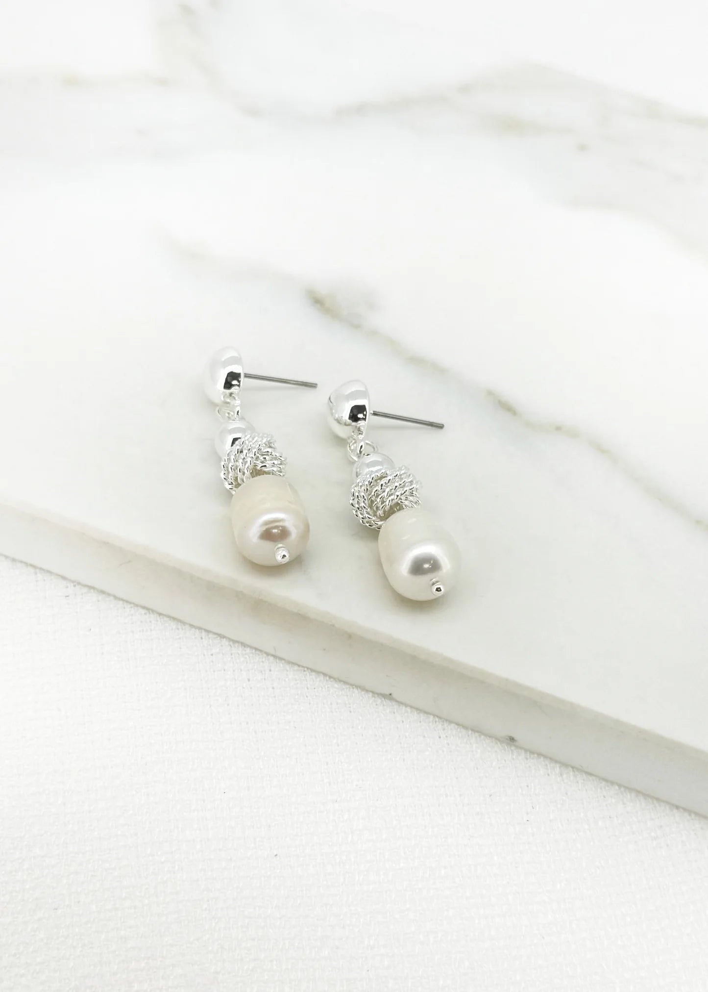 Envy knot & pearl Dropper Earrings In silver