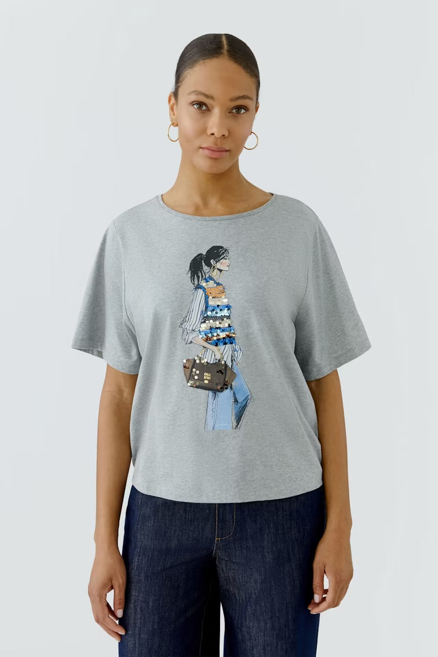 Placed print t-shirt in river stone