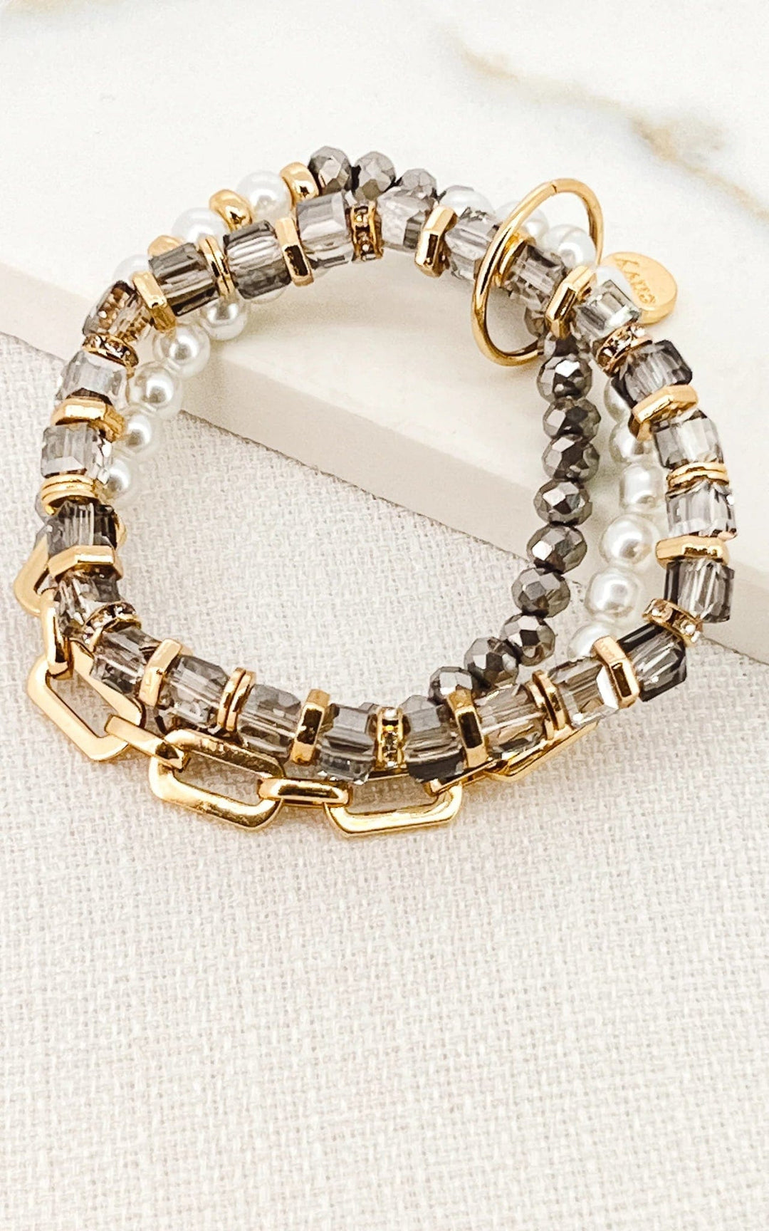 Envy triple layer Pearl Bracelet in gold & grey