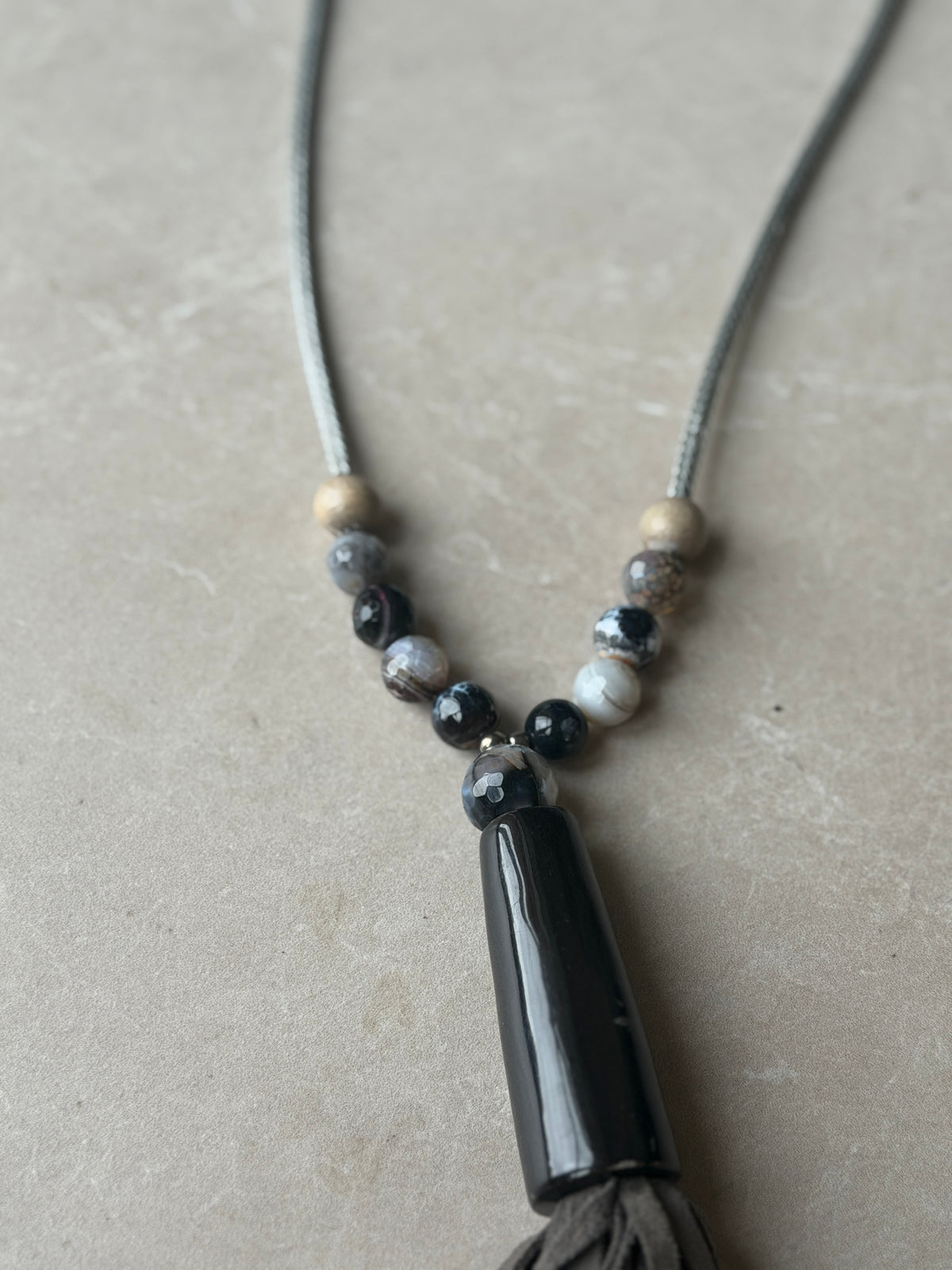 Long cord necklace with tassel & beads