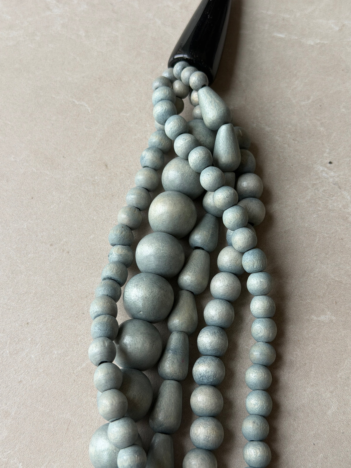 Five strand bead necklace in duck egg