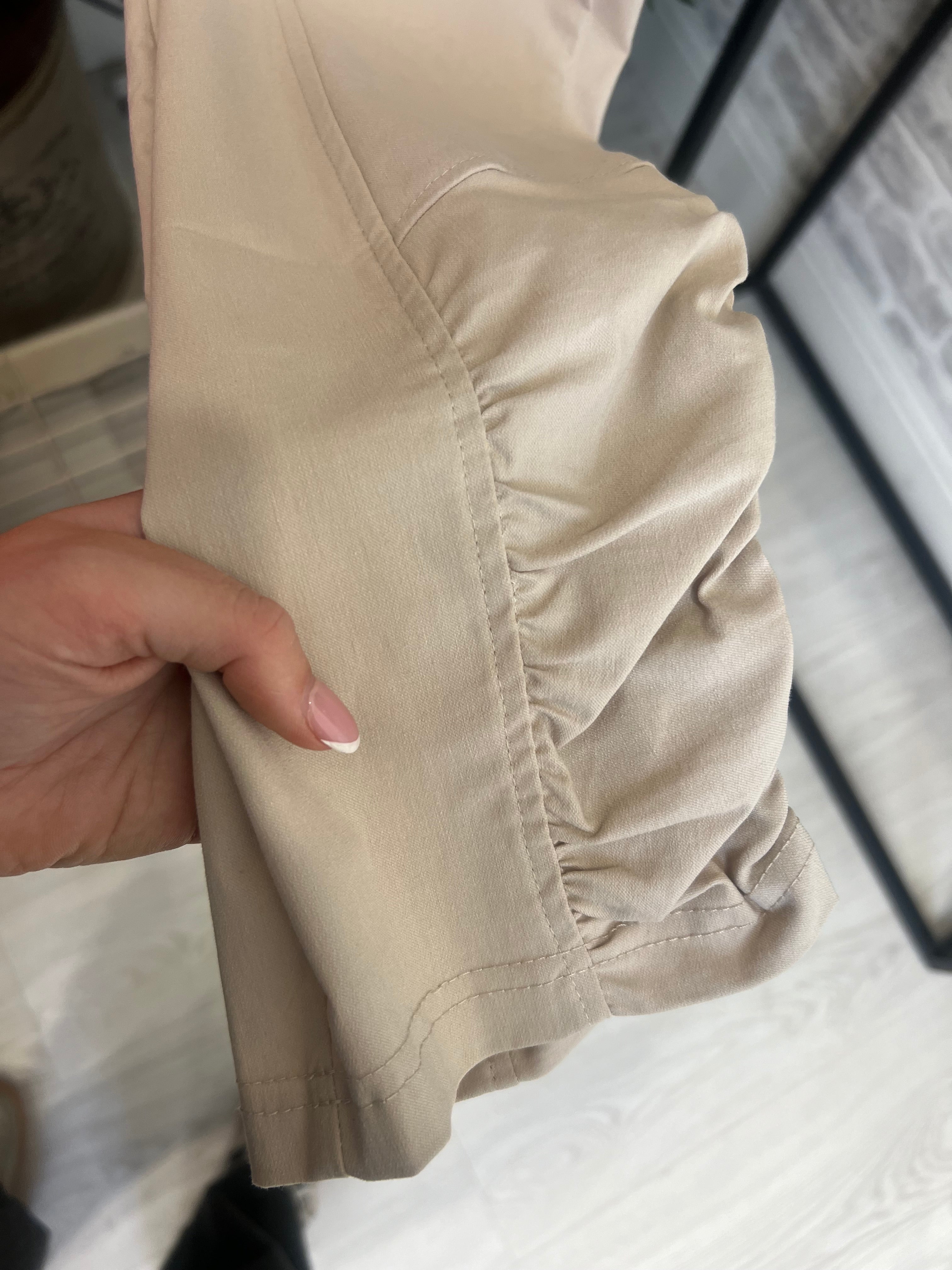 Peruzzi Cropped Ruched Trousers In beige