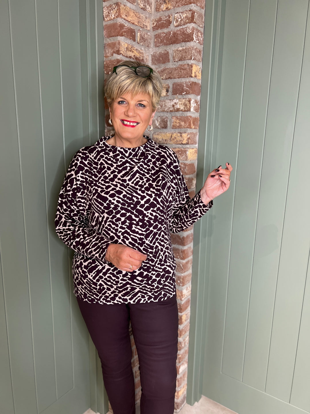 Cecil Buttoned Funnel Top In Eggplant Red