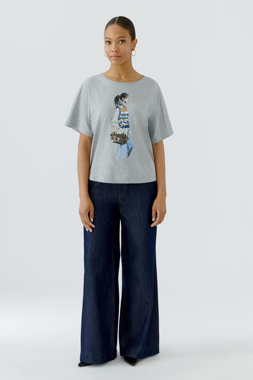 Placed print t-shirt in river stone