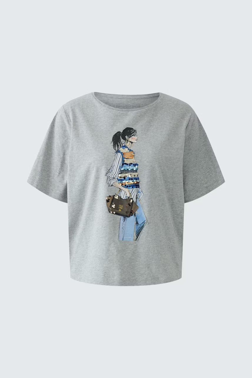 Placed print t-shirt in river stone