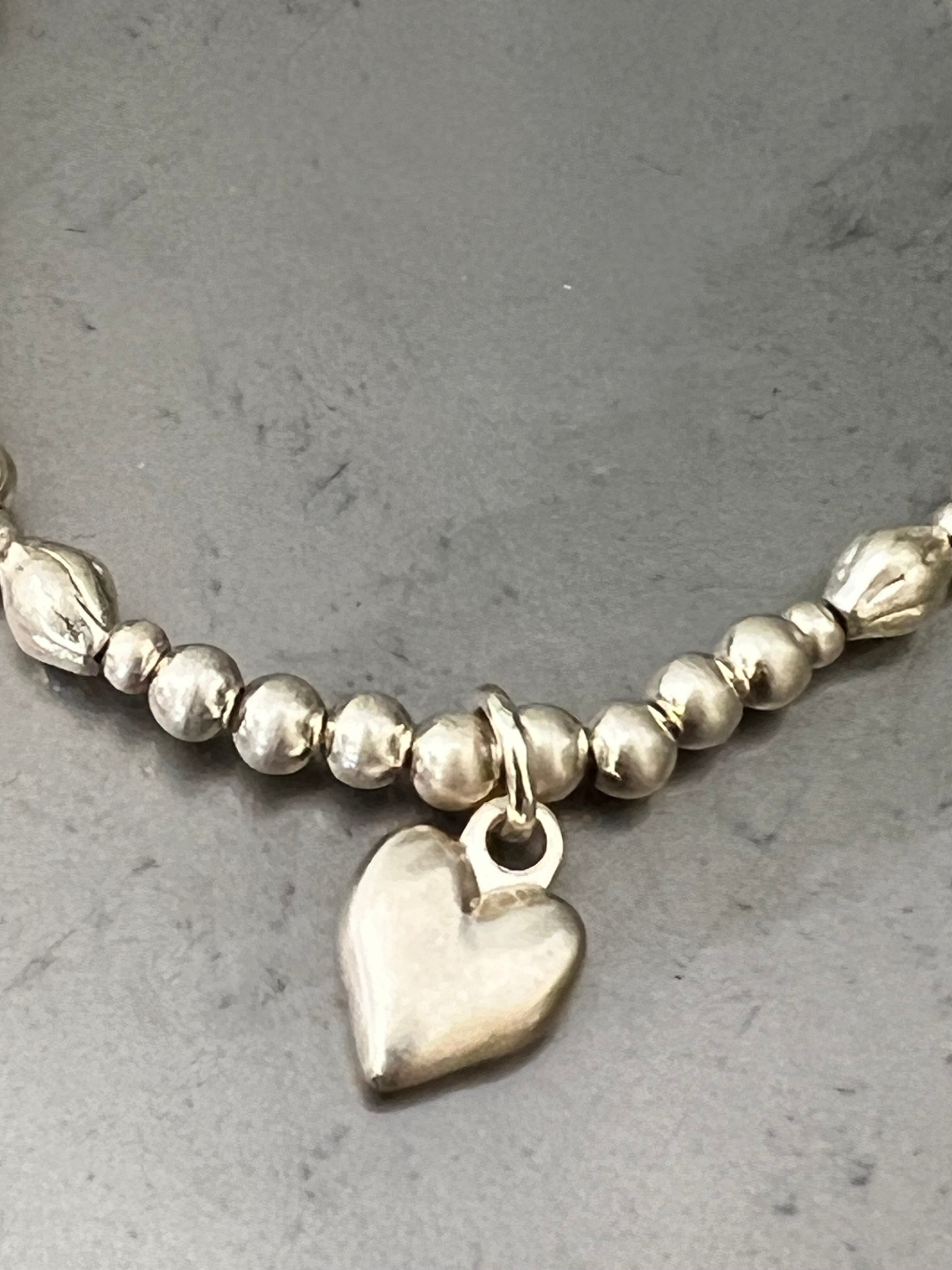 Eliza Gracious Bead Bracelet With Heart Charm In gold