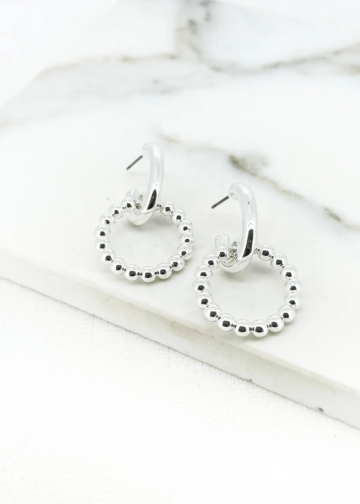 Silver earring with beaded hoop