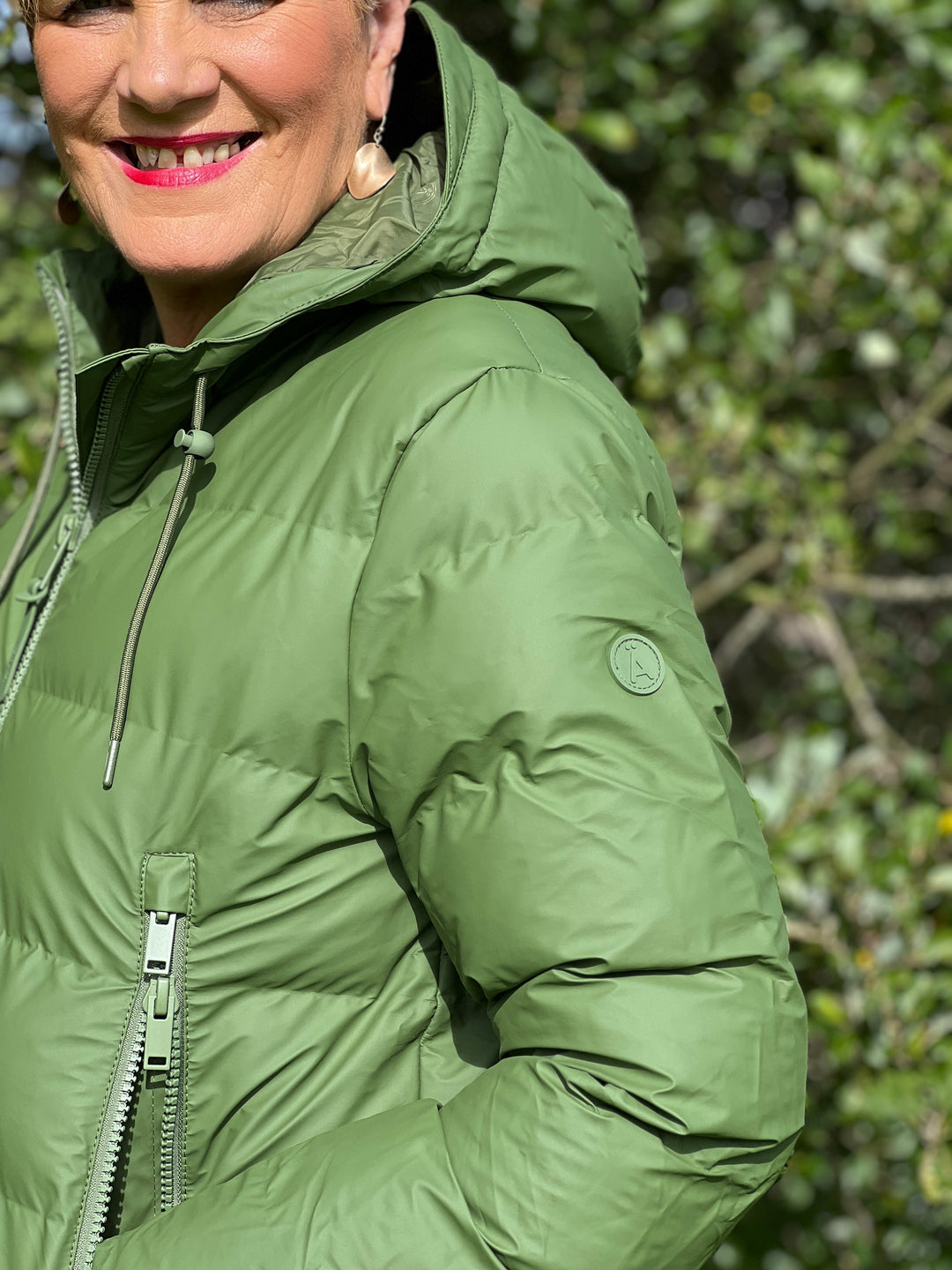 Tanta Nieve Puffa raincoat in Bronze Green