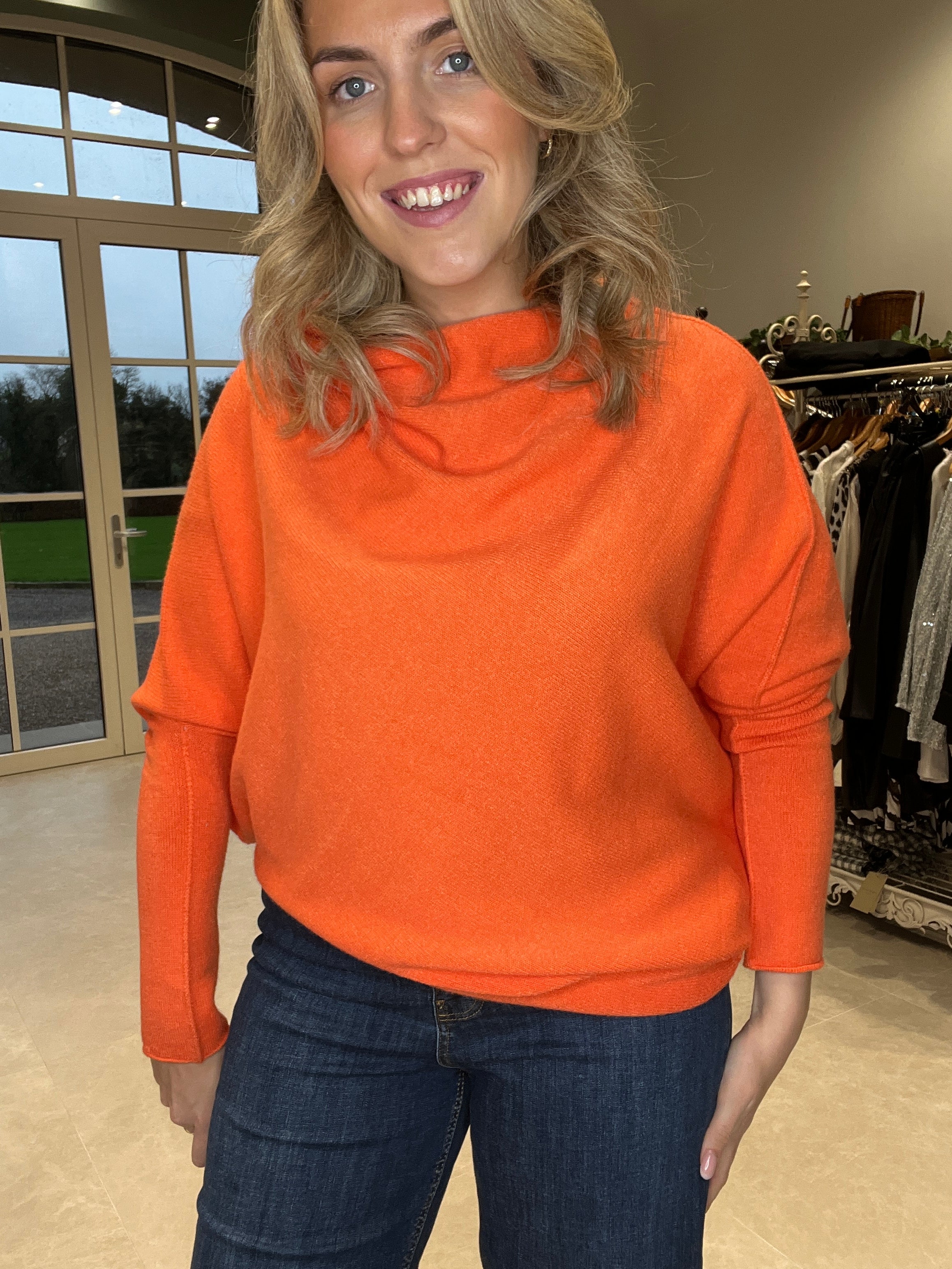 Deck By Decollage Asymmetric Knit In Orange