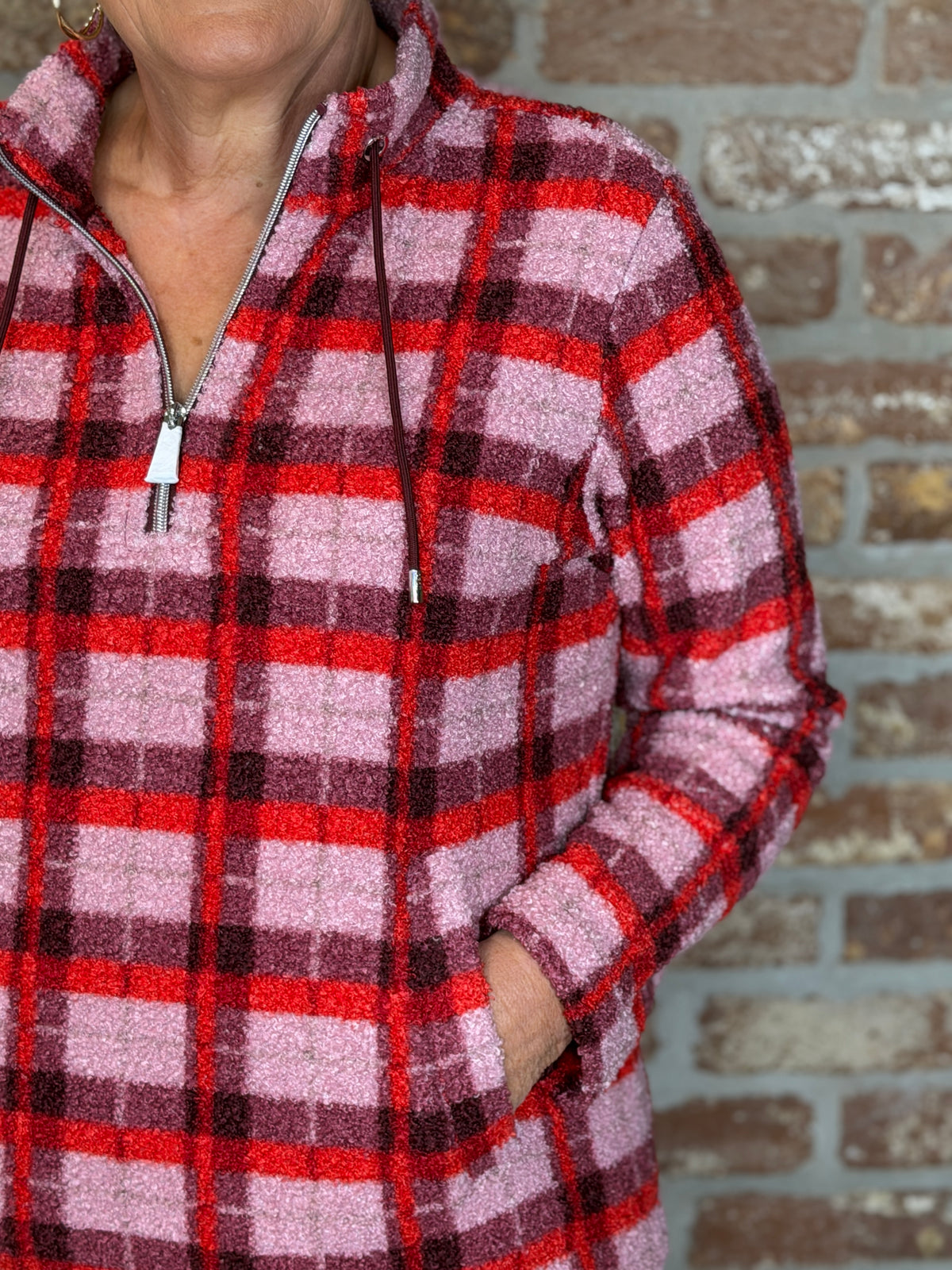 Teddy checked pullover in velvet rose