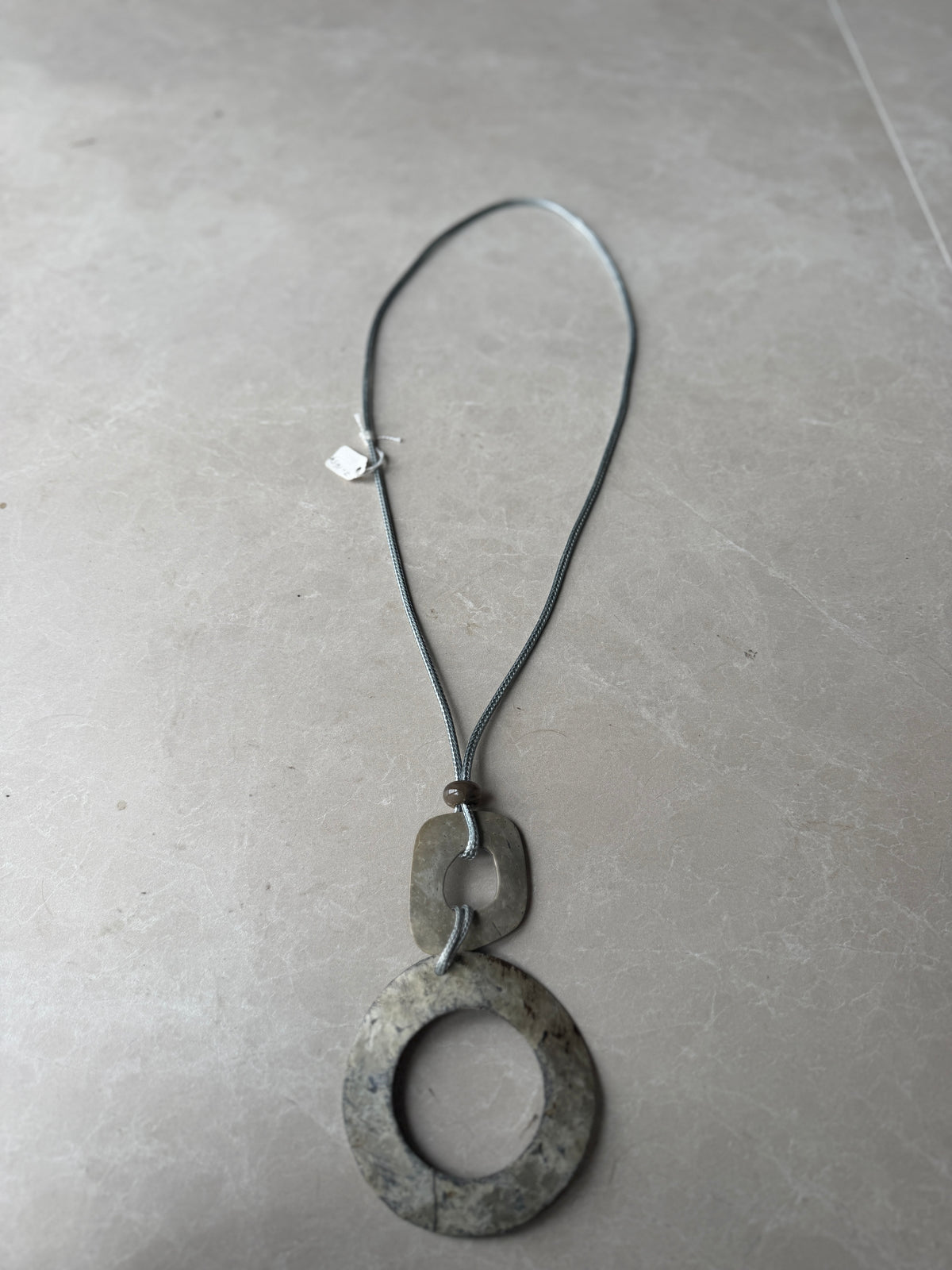 Double disk cord necklace in grey multi