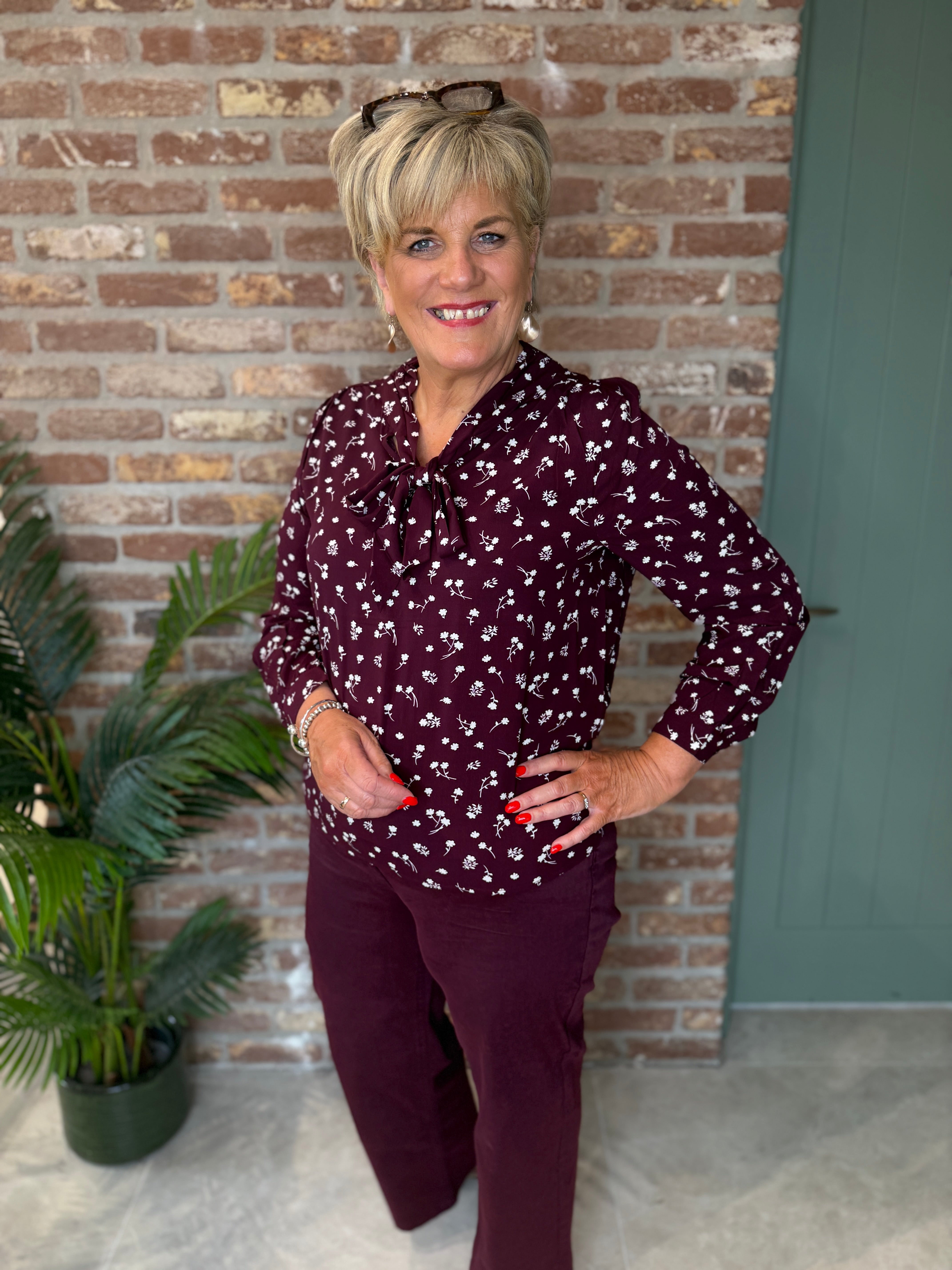 Ditsy print blouse with tie in rustic rouge