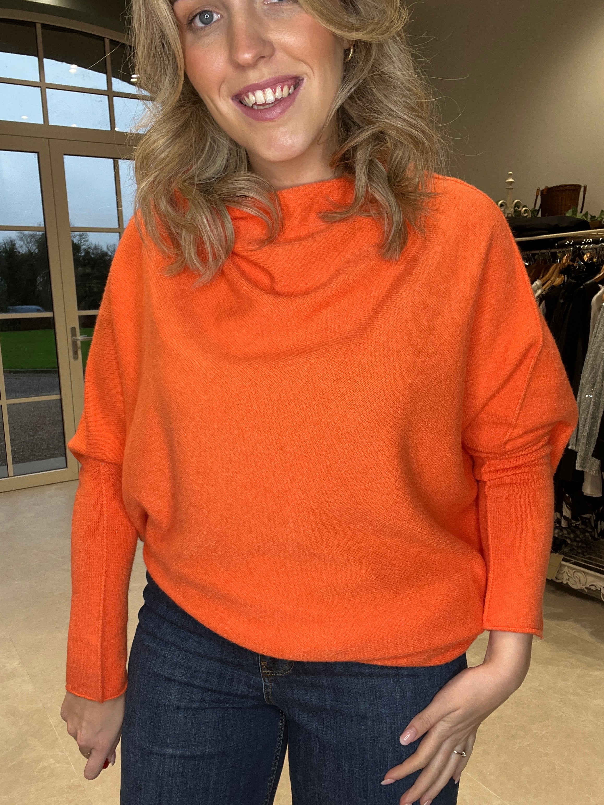 Deck By Decollage Asymmetric Knit In Orange