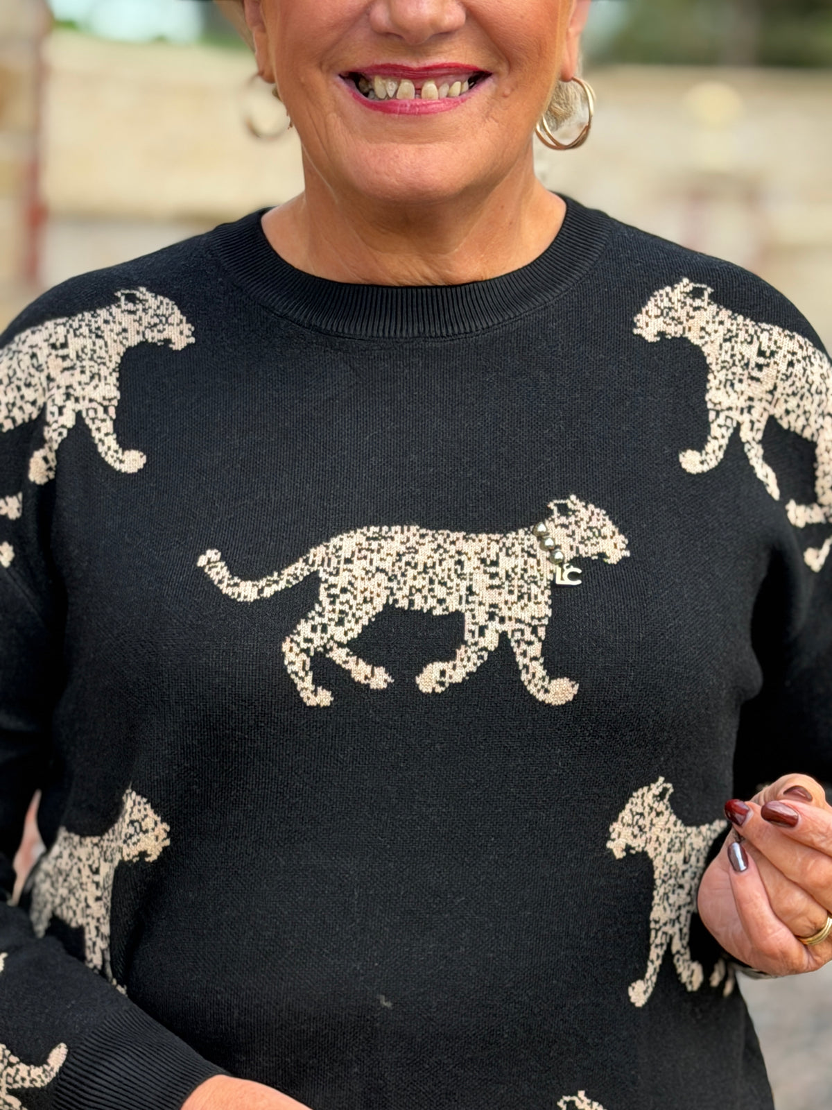 Jacquard leopard pullover in black & brown