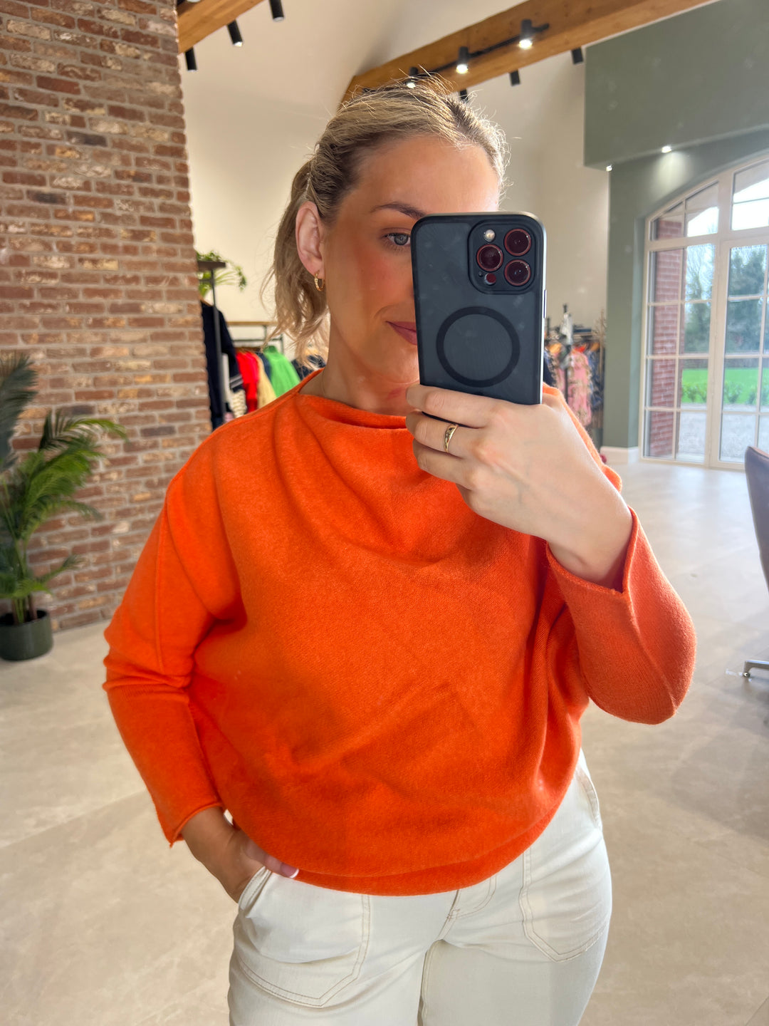 Deck By Decollage Asymmetric Knit In Orange