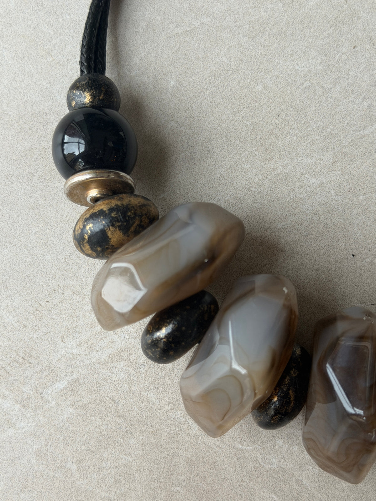 Large bead necklace in black, brown & gold