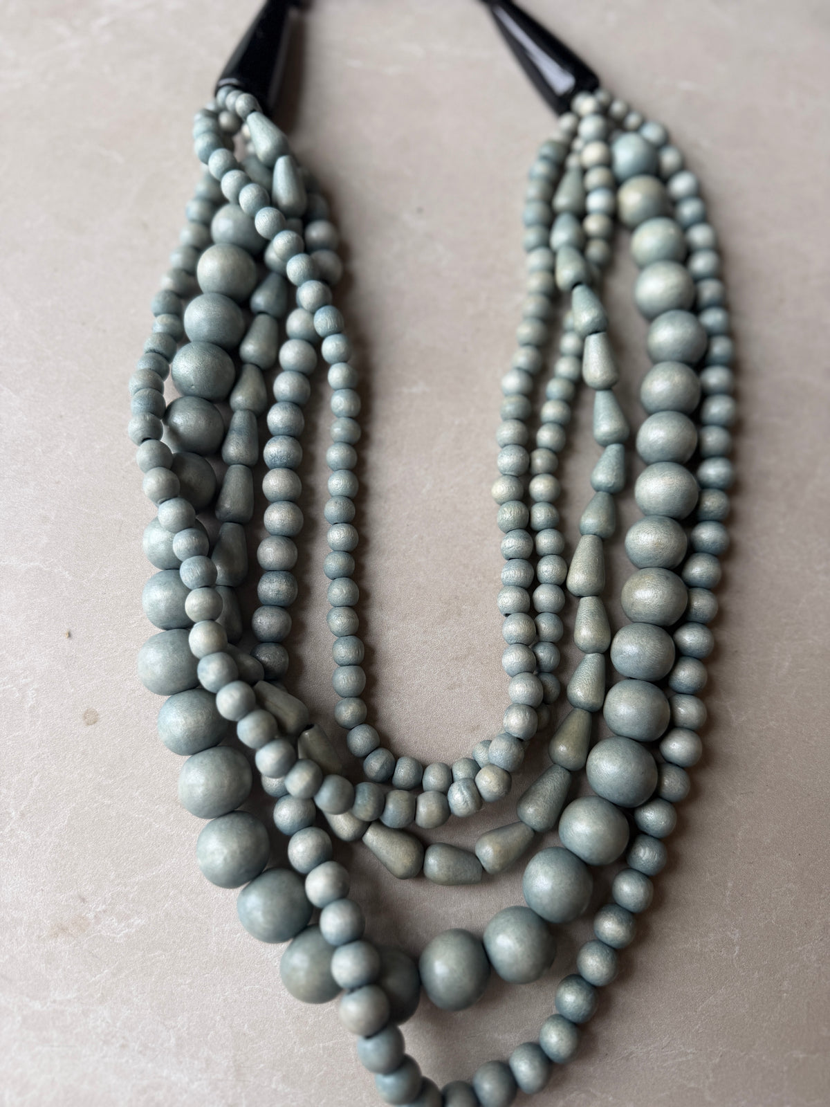 Five strand bead necklace in duck egg
