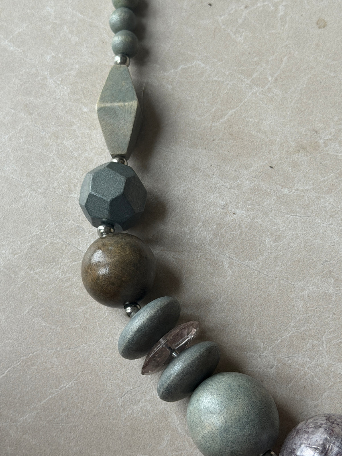Different shaped ball necklace in duck egg mix