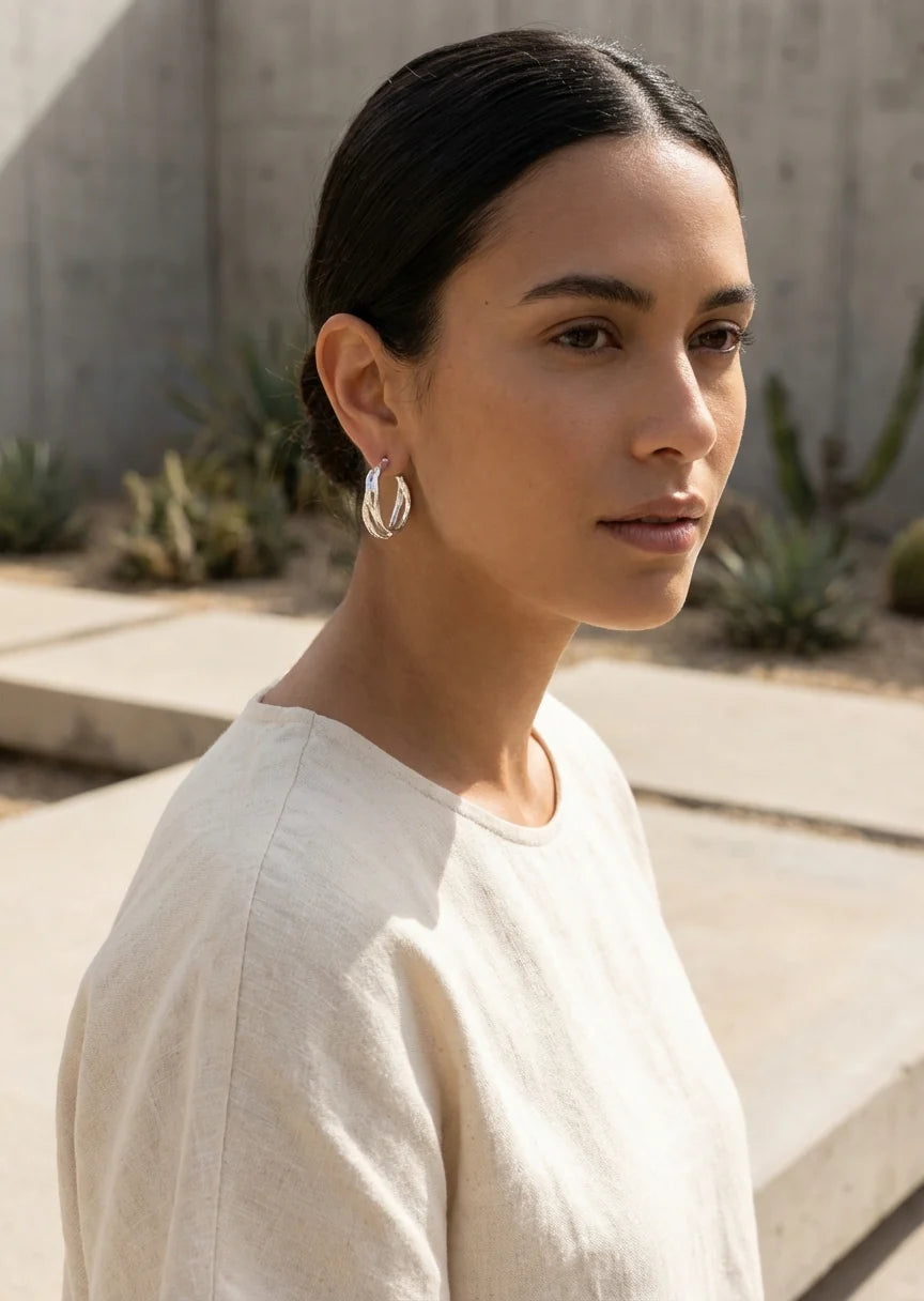 Silver twisted hoop earring