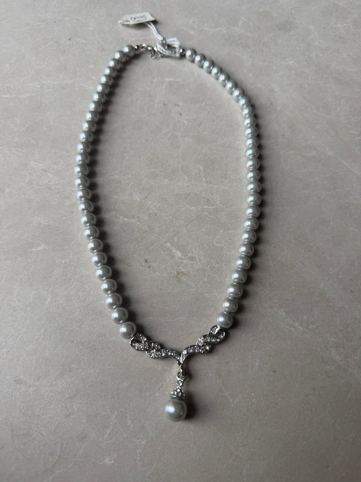 Beaded necklace with single diamond in silver