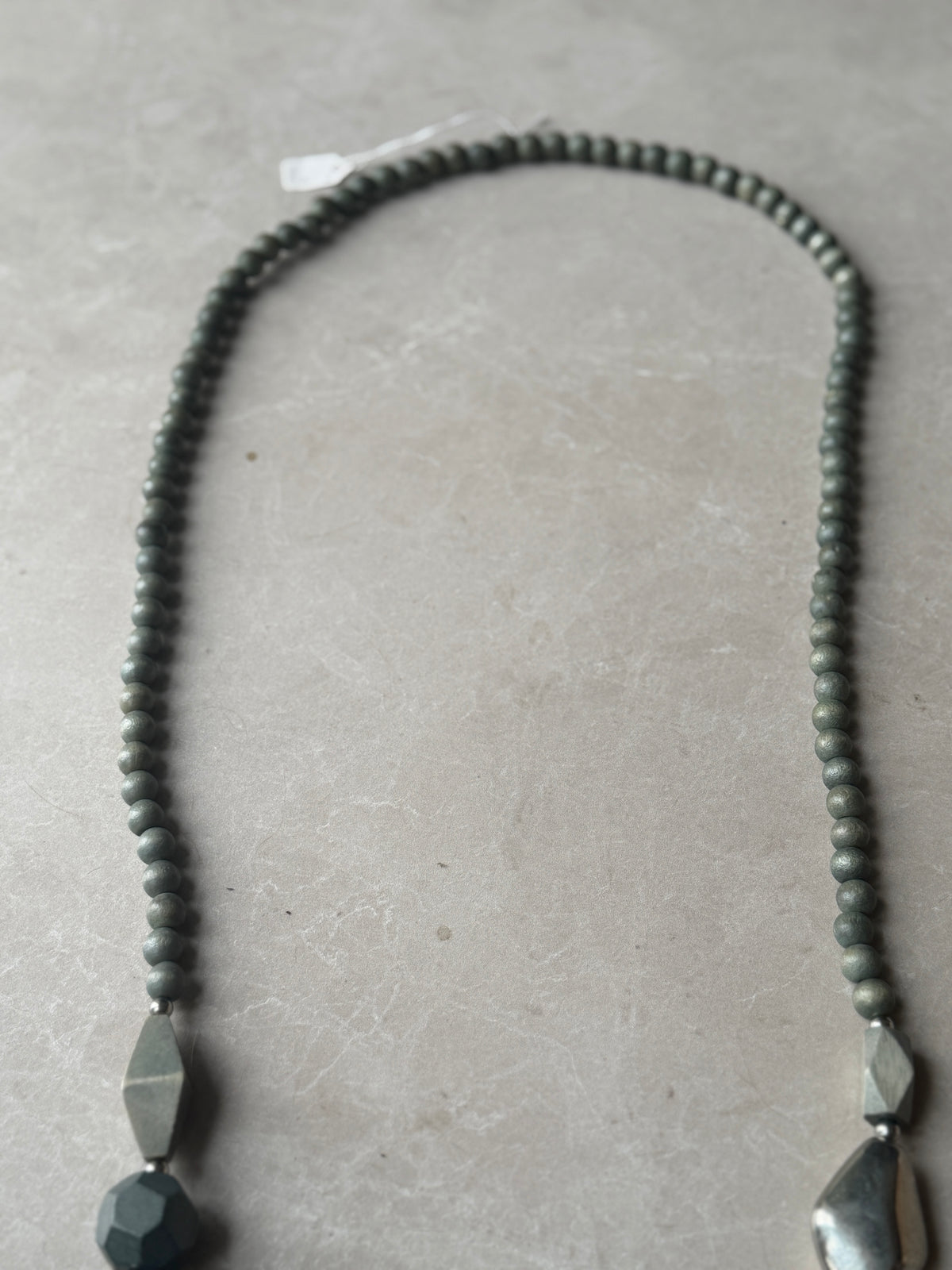 Different shaped ball necklace in duck egg mix