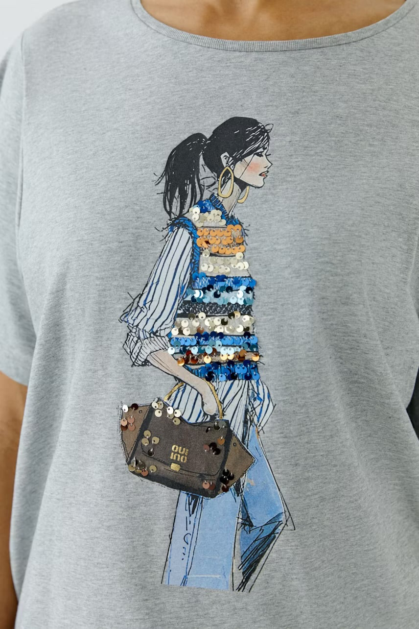 Placed print t-shirt in river stone