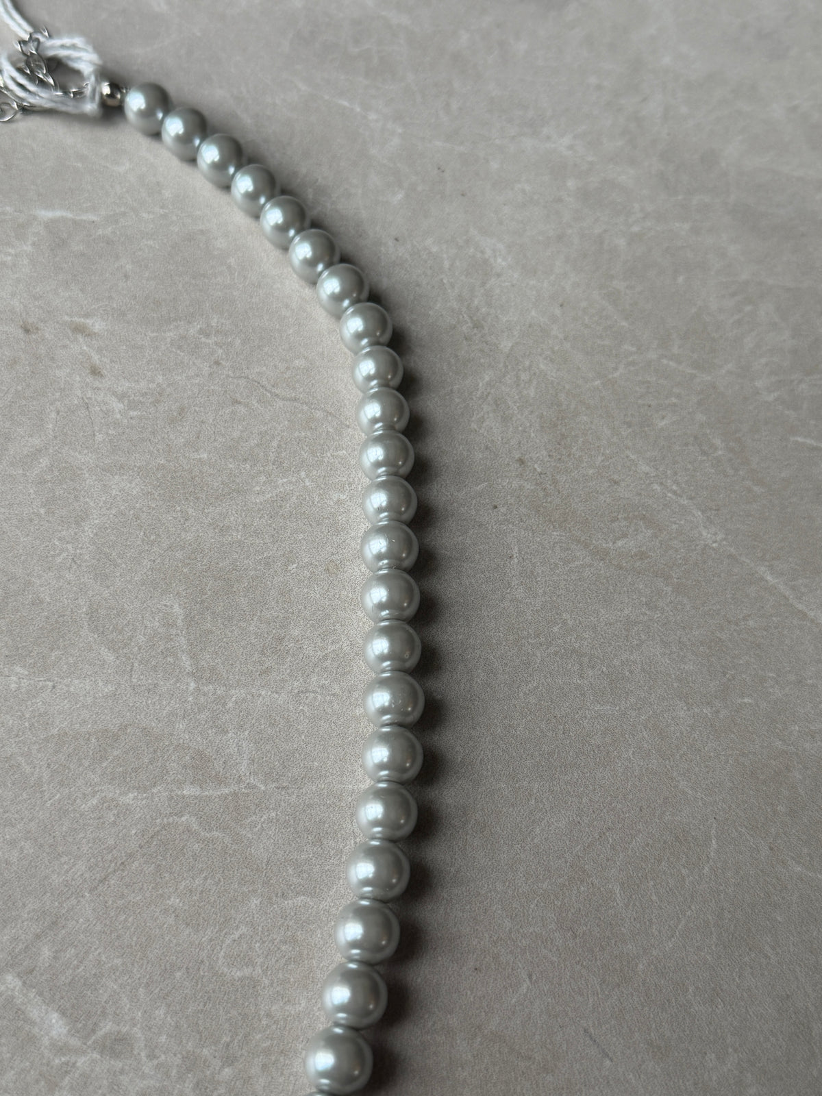 Beaded necklace with single diamond in silver