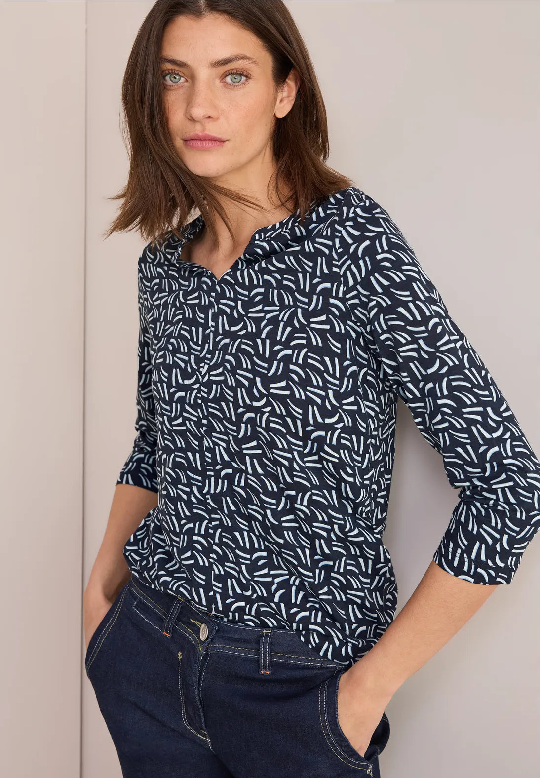 Cecil Slashed Print Top In Universal Blue