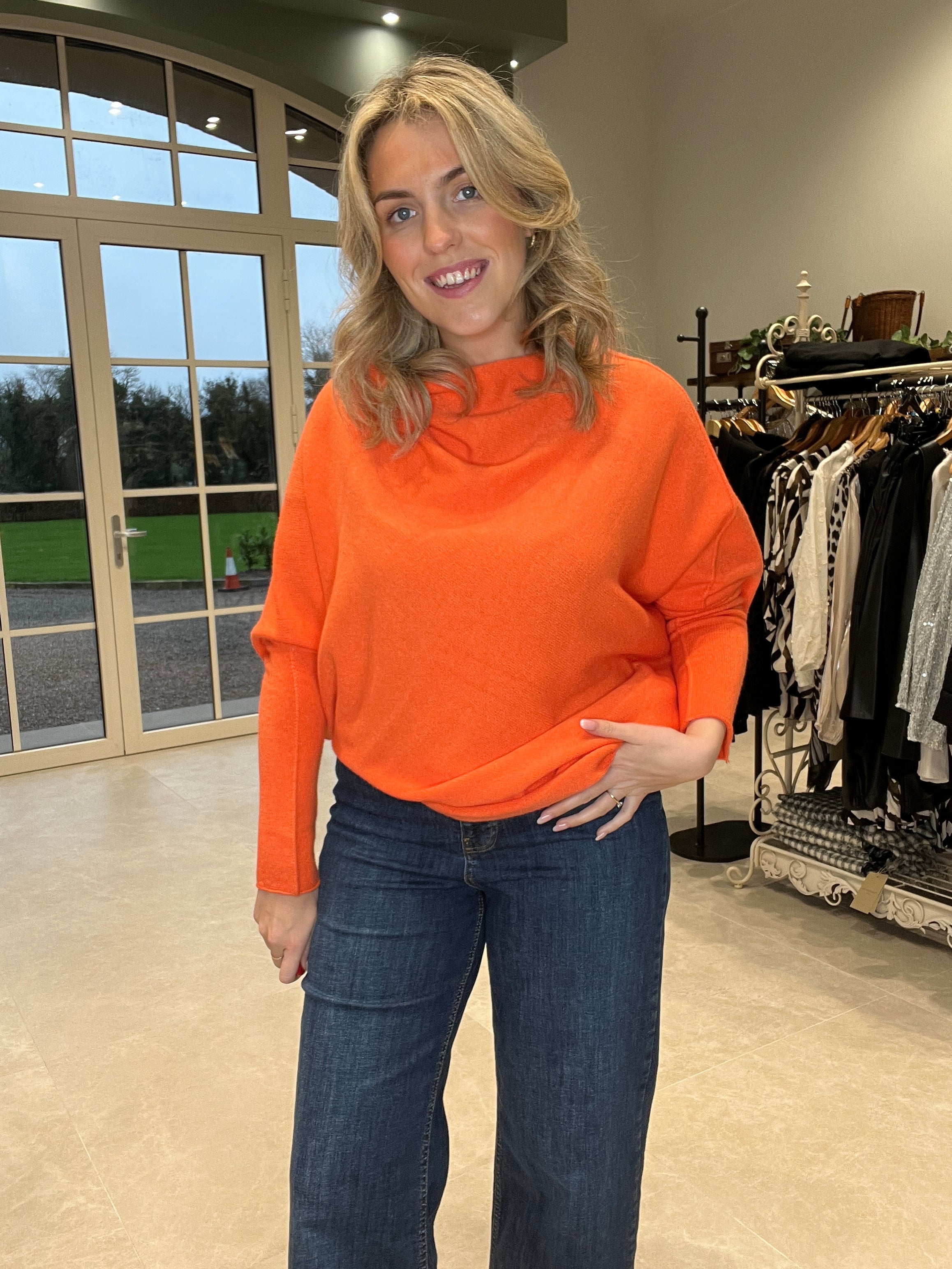 Deck By Decollage Asymmetric Knit In Orange