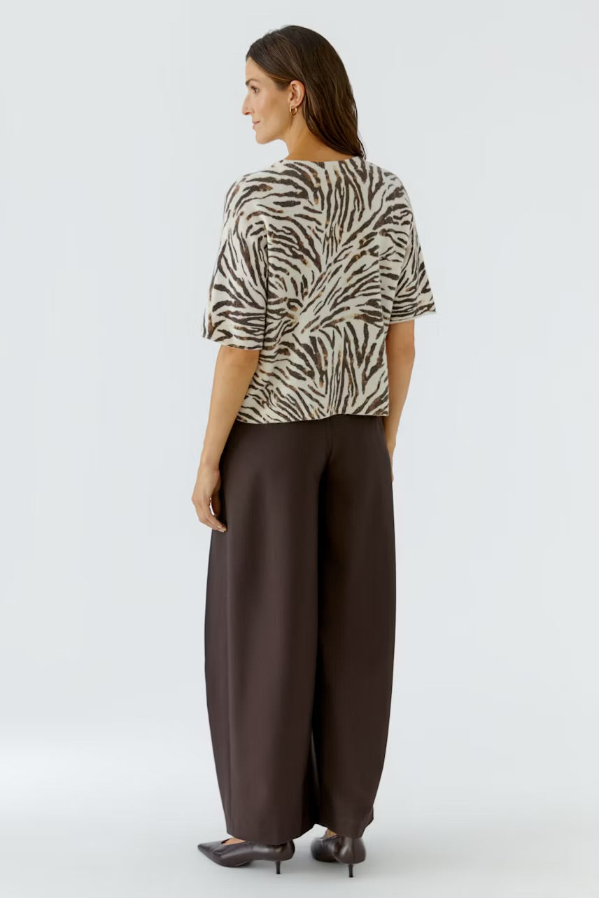 Zebra patterned pullover in white,brown & black