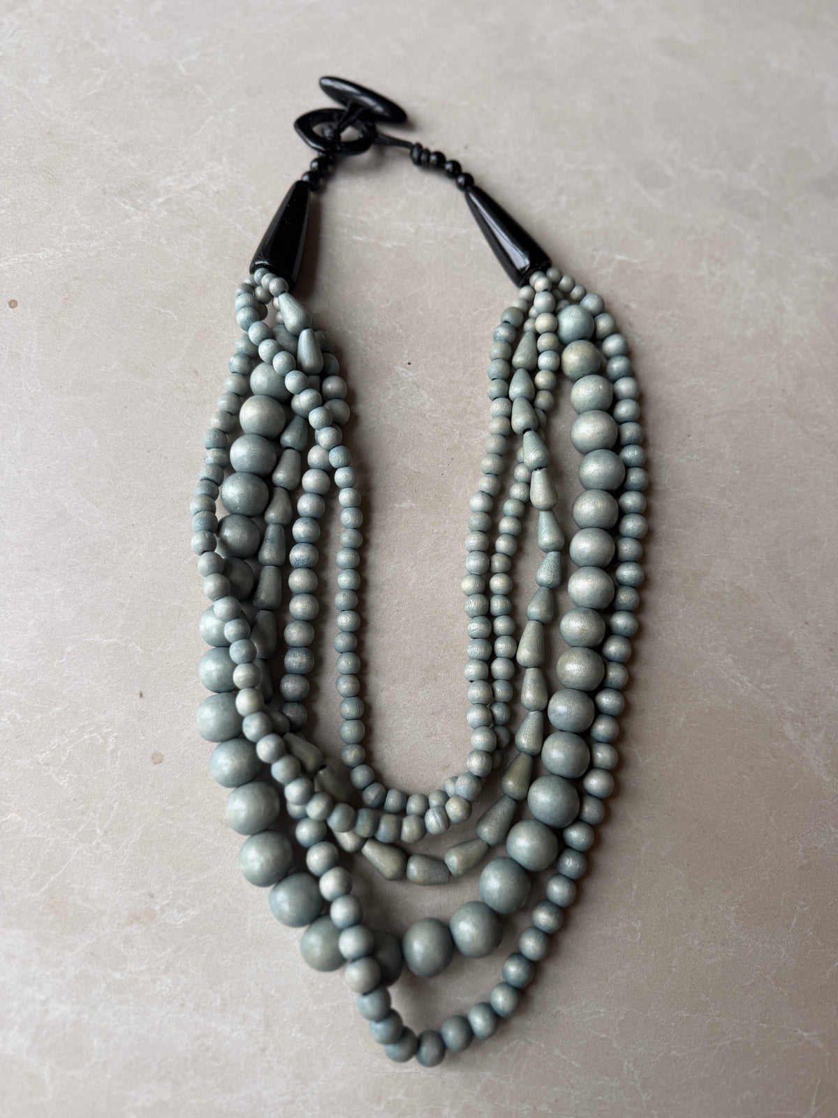 Five strand bead necklace in duck egg